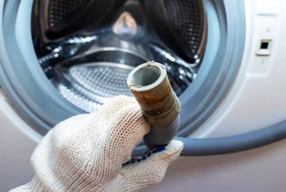 بررسی شلنگ تخلیه ماشین لباسشویی